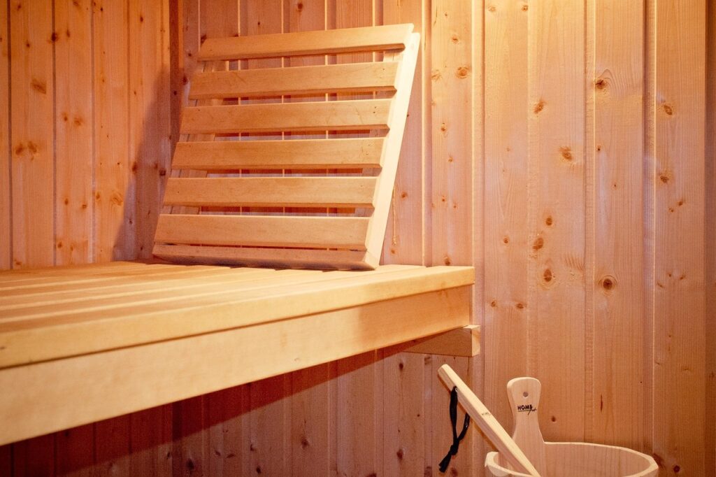 Banc de sauna avec seau et louche